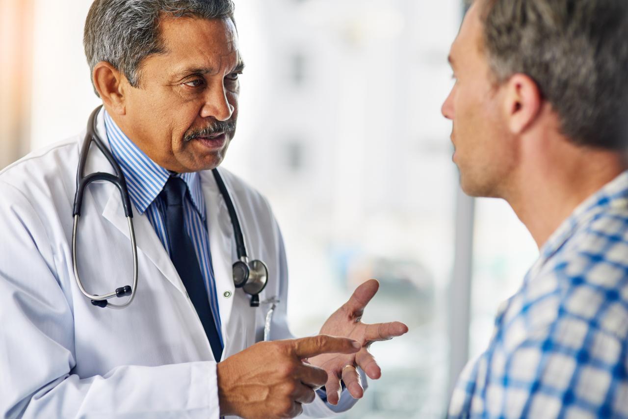 gastroenterologist talking to patient