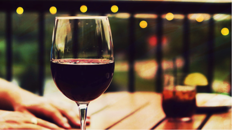 How Sipping From Your Wine Glass Affects Your Smile