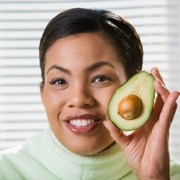 woman-enjoying-avocado-in-raw-diet